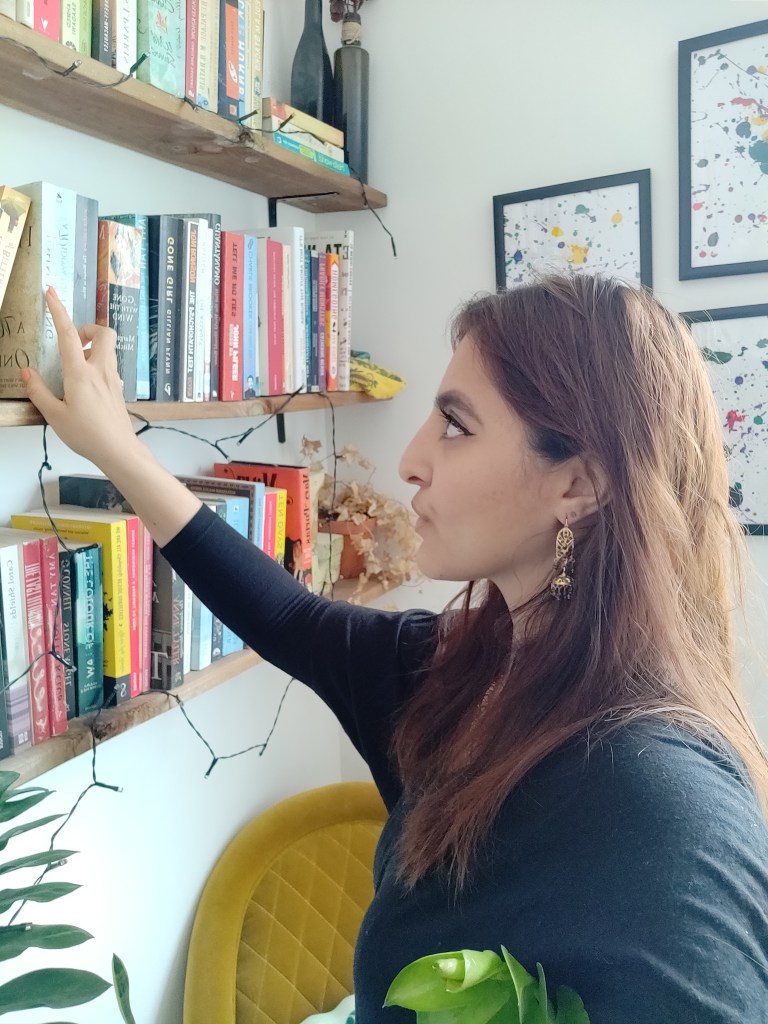 Browsing my bookshelves but finding nothing that really interested me. 